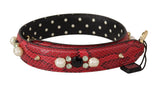 Rood pythonleren, omkeerbare schouderriem van Dolce & Gabbana met kristalversieringen en goudkleurige hardware.