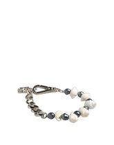 Dolce & Gabbana silver-tone brass bracelet featuring a shell pendant, DG logo charm, and multicolor beaded accents.