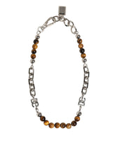Dolce & Gabbana silver-tone brass chain bracelet featuring natural gemstone beads and a central DG logo charm.
