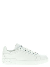 Dolce & Gabbana white calfskin low top sneakers featuring a minimalist profile and clean leather finish.