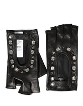 Dolce & Gabbana black lamb leather mittens featuring ornate crystal and gold-tone floral embellishments on the front.