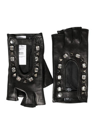 Dolce & Gabbana black lamb leather mittens featuring ornate crystal and gold-tone floral embellishments on the front.