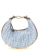 Front view of a Fendi blue cotton handbag featuring the iconic FF monogram pattern and structured top handles.