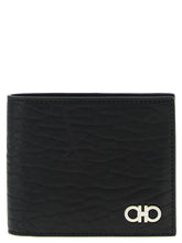 Ferragamo men's bifold wallet in premium black calfskin leather featuring a discreet embossed logo on the front.