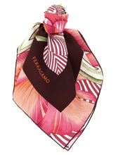 Ferragamo multicolor silk scarf featuring a vibrant botanical print and signature logo on a white background.