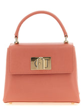 Front view of a Furla multicolor calfskin handbag featuring a structured silhouette and elegant top handle design.