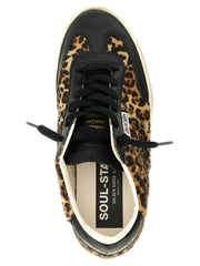 Close-up of Golden Goose sneakers showcasing the intricate texture of the multicolor cowhide and refined stitching.