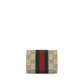 Front view of a Gucci beige cotton wallet featuring the iconic GG monogram pattern and refined leather trim.