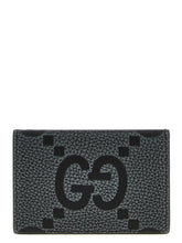 Front view of a Gucci black calfskin cardholder featuring the iconic interlocking G logo in silver-tone metal.