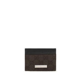 Front view of a Gucci brown polyester wallet for women, featuring a refined textured finish and classic design.