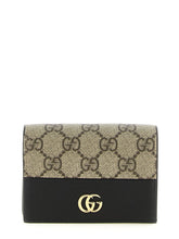 Front view of a Gucci multicolor calfskin cardholder featuring iconic GG logo hardware and vibrant leather panels.