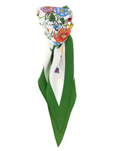Front view of a Gucci white silk foulard, featuring a refined square silhouette and delicate hand-rolled edges.