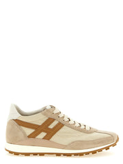 Zapatillas deportivas Hogan beige de poliamida en una silueta refinada de caña baja con cordones tonales y suelas de goma estructuradas.