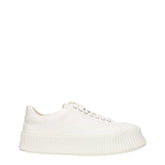 Jil Sander white fabric platform sneakers for men featuring a minimalist low-top silhouette and chunky rubber sole.