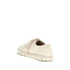 Rear view of Marsell white leather derbies highlighting the clean heel construction and premium Italian craftsmanship.