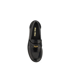 Miu Miu Black Rubber Slip-On Loafers