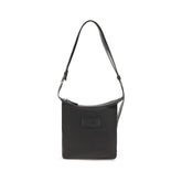Front view of the MM6 Maison Margiela black nylon shoulder bag featuring a minimalist rectangular silhouette.
