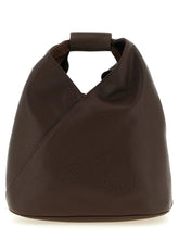 Front view of the MM6 Maison Margiela brown polyethylene crossbody bag featuring a minimalist rectangular silhouette.