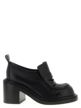 Moschino Schwarze Plateauslippers aus Leder