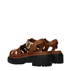 Sandales compensées en cuir marron Prada