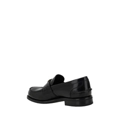 Prada Triangular plaque Loafers - Flats