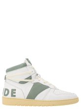 Rhude bicolor calfskin high top sneakers in black and white leather, showcasing a classic basketball-inspired silhouette.