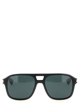 Front view of Saint Laurent black acetate sunglasses featuring a classic rectangular frame and dark tinted lenses.