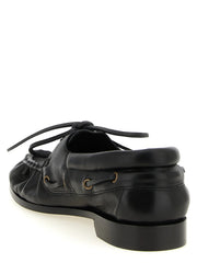 Saint Laurent svarte kalveskinns slip-on loafers
