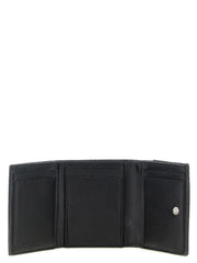 Primer plano de las ranuras interiores del tarjetero de Stella McCartney y la tela vegana Shaggy Deer texturizada en negro.