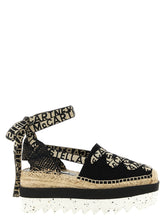 Stella McCartney multicolor cotton wedge sandals featuring vibrant striped canvas straps and a high platform sole.