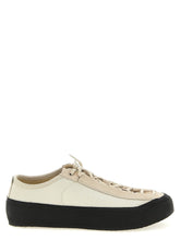 Stone Island beige calfskin low top sneakers featuring a minimalist profile and tonal rubber soles for men.