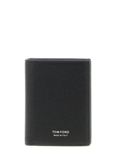 Front view of a Tom Ford black calfskin cardholder featuring gold-tone logo embossing and multiple card slots.