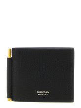Tom Fordin musta vasikannahkainen korttiteline, jossa on minimalistinen etuosa ja kullanväriset logovarsinnat.