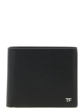 Front view of a Tom Ford black calfskin leather wallet featuring a subtle grained texture and gold-tone logo hardware.