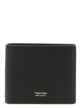 Front view of a Tom Ford black calfskin leather wallet featuring a subtle grained texture and gold-tone logo hardware.