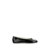 Front view of Tory Burch black calf leather Bos Taurus ballet flats featuring a classic rounded toe and refined silhouette.