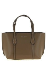 Vista frontal de un bolso tote marrón de cuero de vaca de Tory Burch con asas de cuero estructuradas y una silueta minimalista.