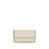 Valentino Garavani beige calf leather Bos Taurus wallet featuring a gold-tone VLogo Signature emblem on the front.