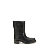 Valentino Garavani black calf leather Bos Taurus ankle boots featuring a sleek pointed toe and sculpted block heel.