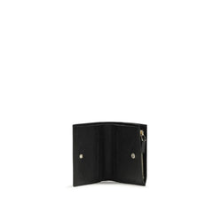 Interior detail of the Valentino Garavani lambskin wallet displaying organized card slots and premium craftsmanship.