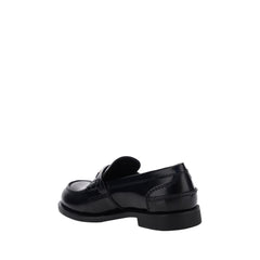 Miu Miu Black Rubber Slip-On Loafers