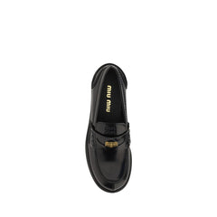 Miu Miu Black Rubber Slip-On Loafers