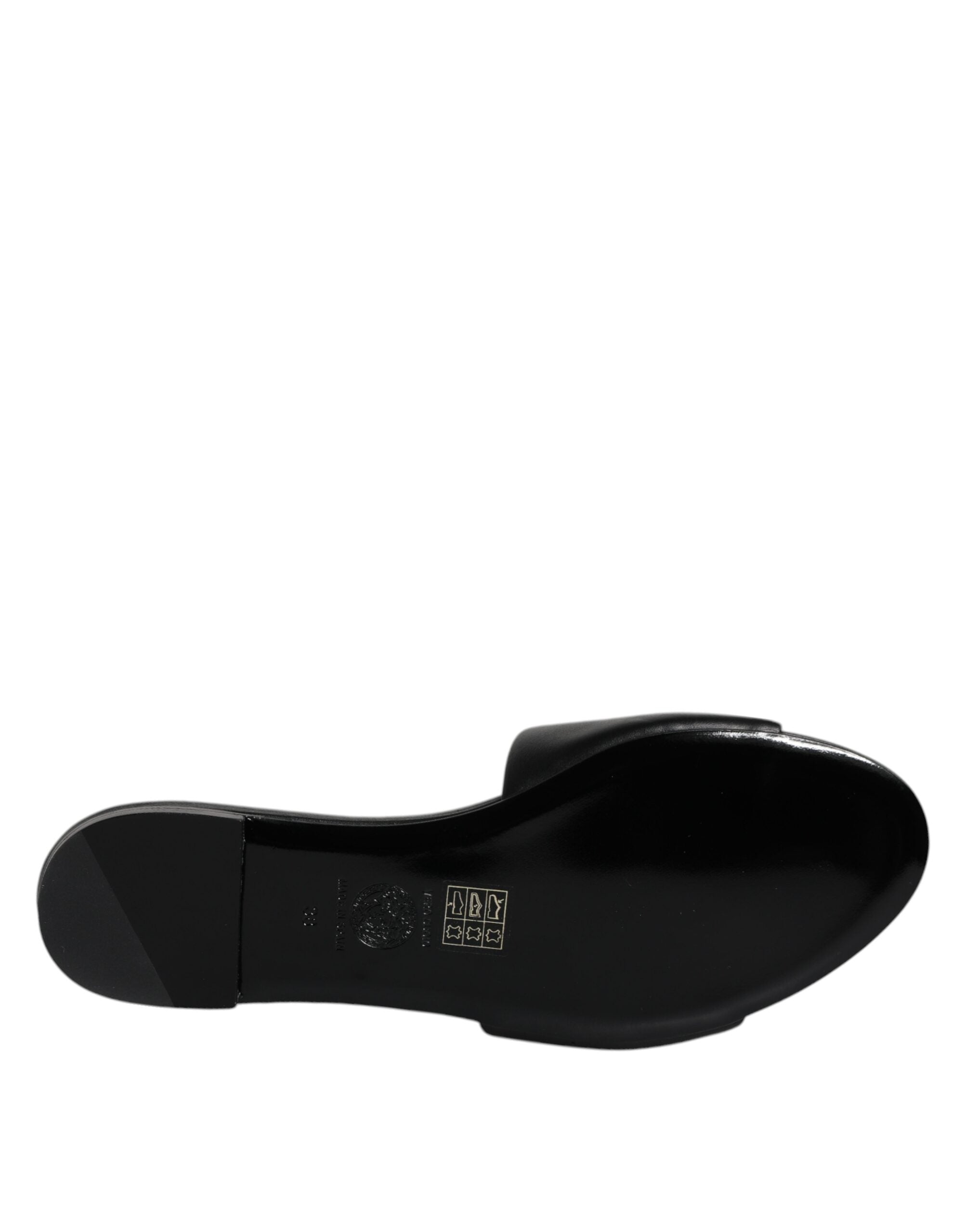 Sandales plates Versace en cuir noir avec plaque logo