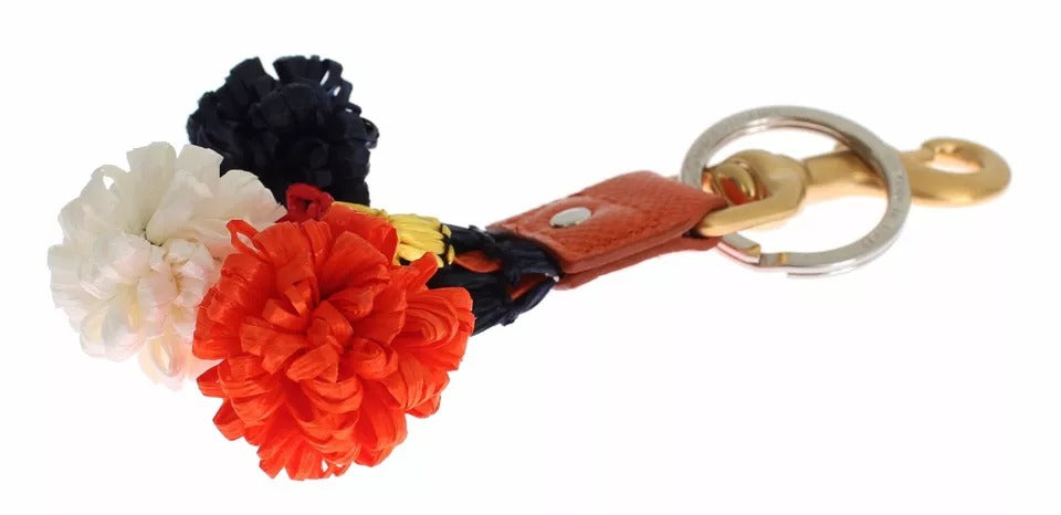 Porte-clés Dolce &amp; Gabbana en raphia marron doré avec fermoir et chaînette.