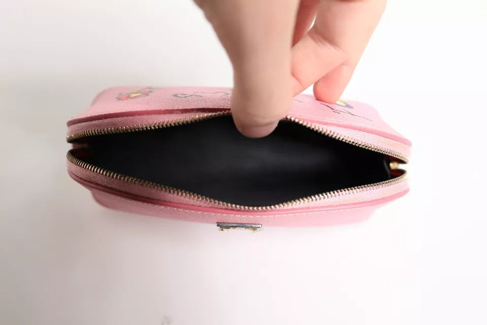 Pochette portefeuille Dolce &amp; Gabbana en cuir rose avec logo DG et fermeture éclair