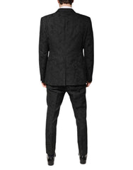 Dolce &amp; Gabbana Zweiteiliger Anzug aus schwarzem Polyester mit floralem Jacquardmuster