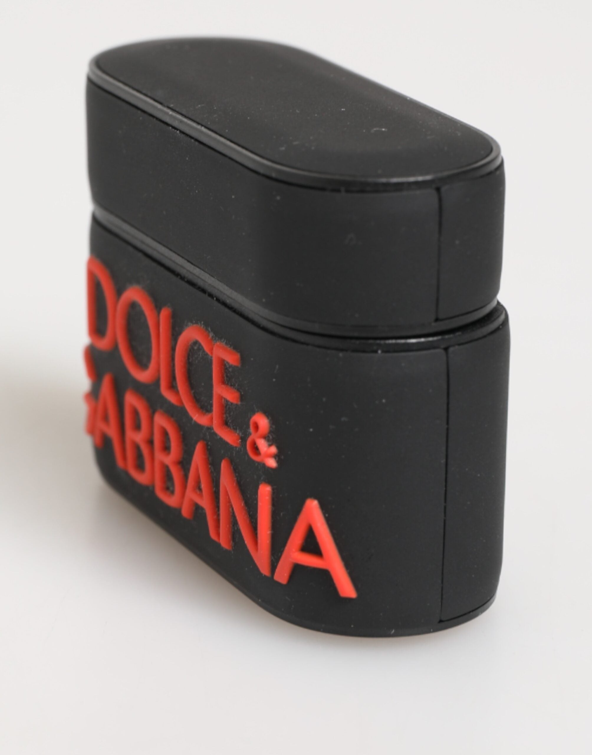 Dolce &amp; Gabbana AirPods-Hülle aus schwarzem und orangefarbenem Gummi mit geprägtem Logo