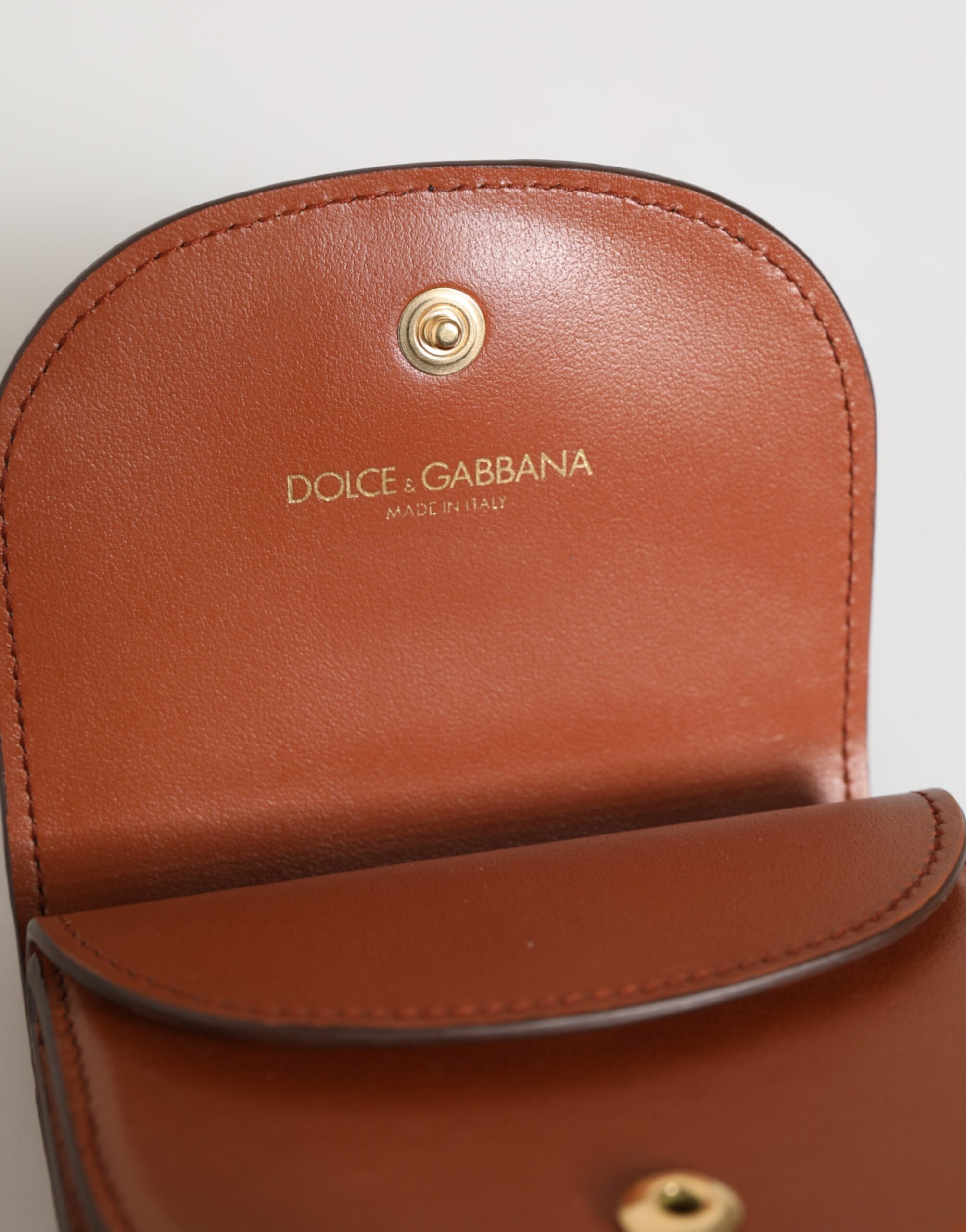 Portefeuille Dolce &amp; Gabbana en cuir de veau marron et noir à imprimé léopard et logo.