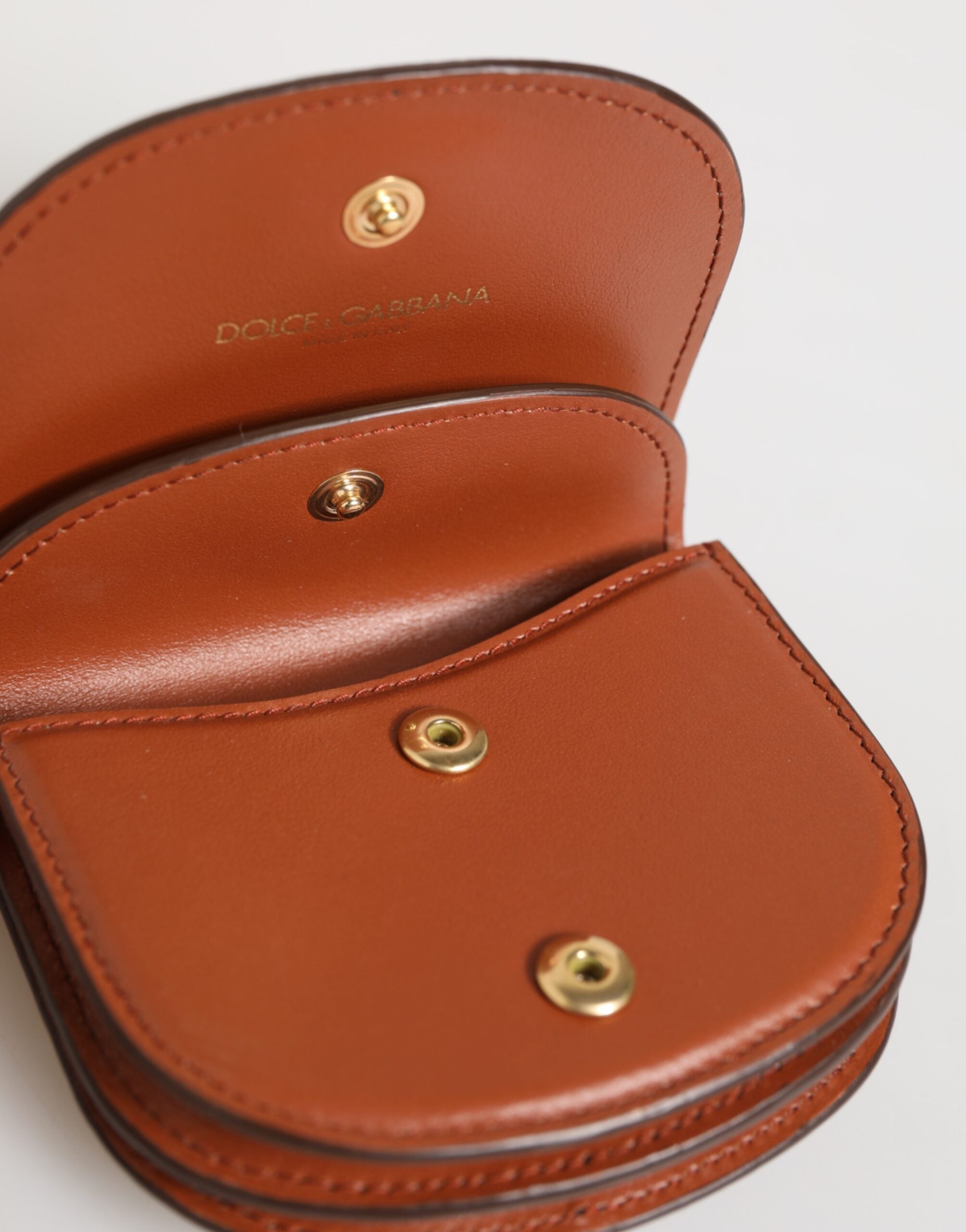 Portefeuille Dolce &amp; Gabbana en cuir de veau marron et noir à imprimé léopard et logo.