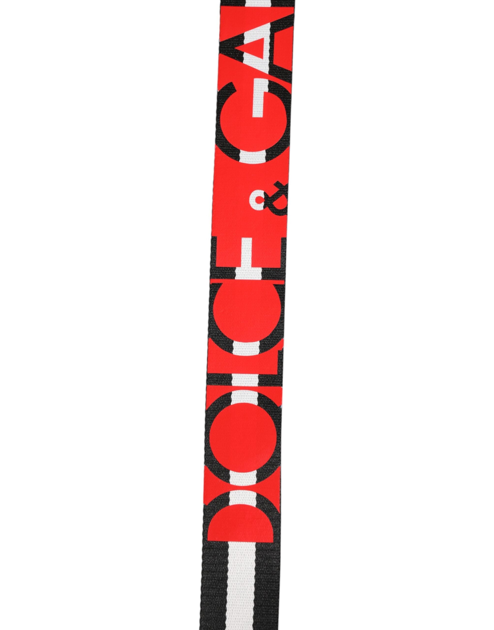 Dolce &amp; Gabbana Gürtel mit schwarz-weißen Streifen und Logo-Metallschnalle